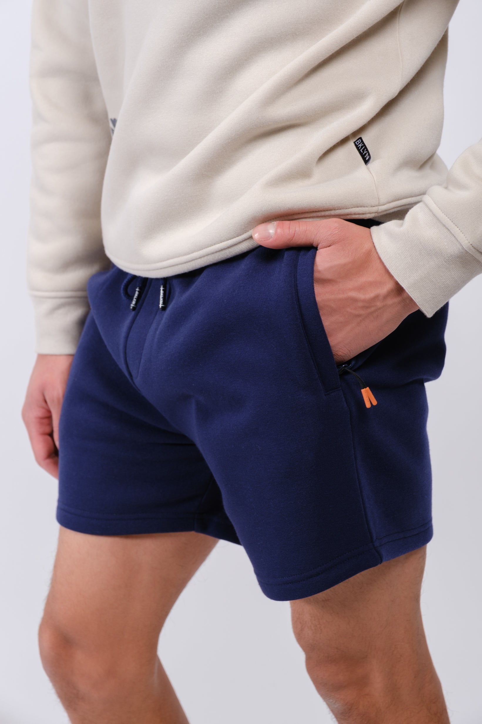 Comfortable men’s fleece shorts with zip pocket and 5 inch inseam
#color_french navy