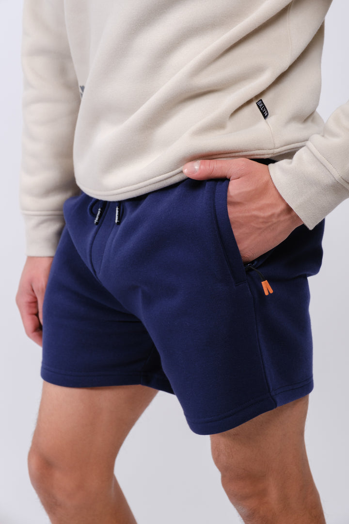 Comfortable men’s fleece shorts with zip pocket and 5-inch inseam
#color_french-navy
