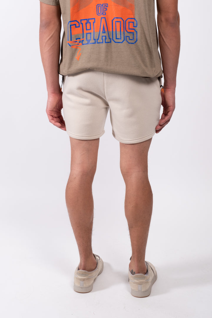 Men’s 5 inseam fleece shorts with zip pocket for secure storage
#color_sand
