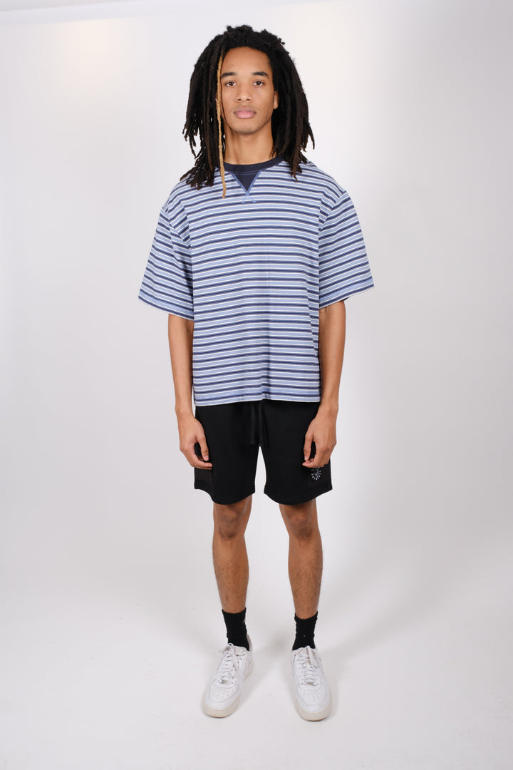 Stylish men's 7-inch fleece shorts with durable nylon pocket accents
#color_black