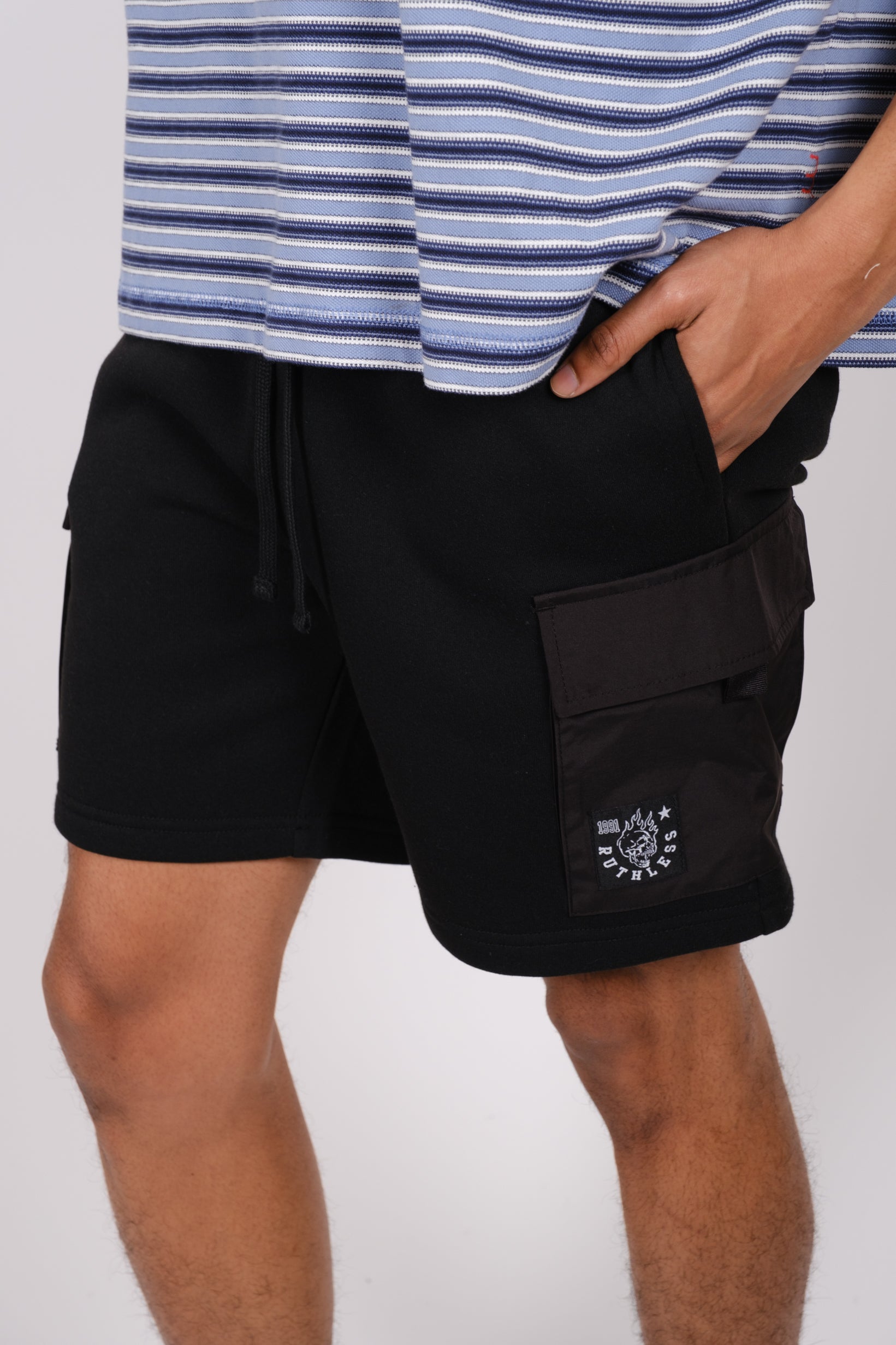 7 inch fleece shorts with nylon pockets for men, designed for utility
#color_black