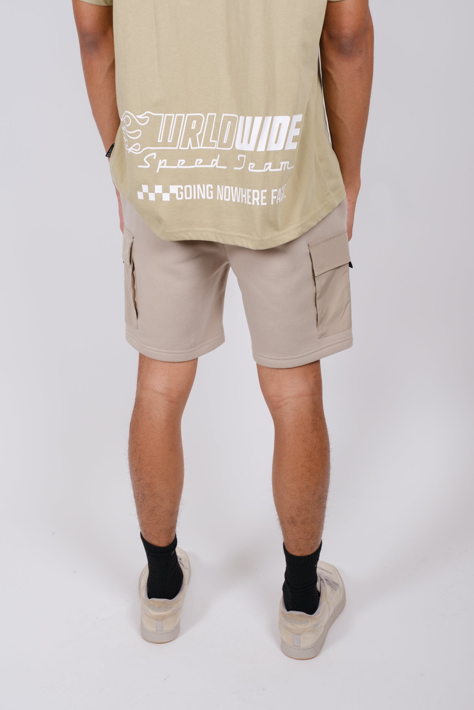 Men's 7-inch inseam fleece shorts with practical nylon pocket storage
#color_pumice-stone