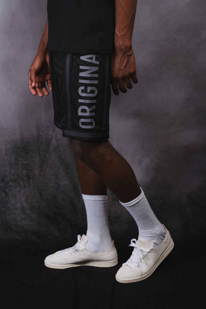 Paneled Originals Basketball Shorts with elastic waistband for secure fit
#color_black