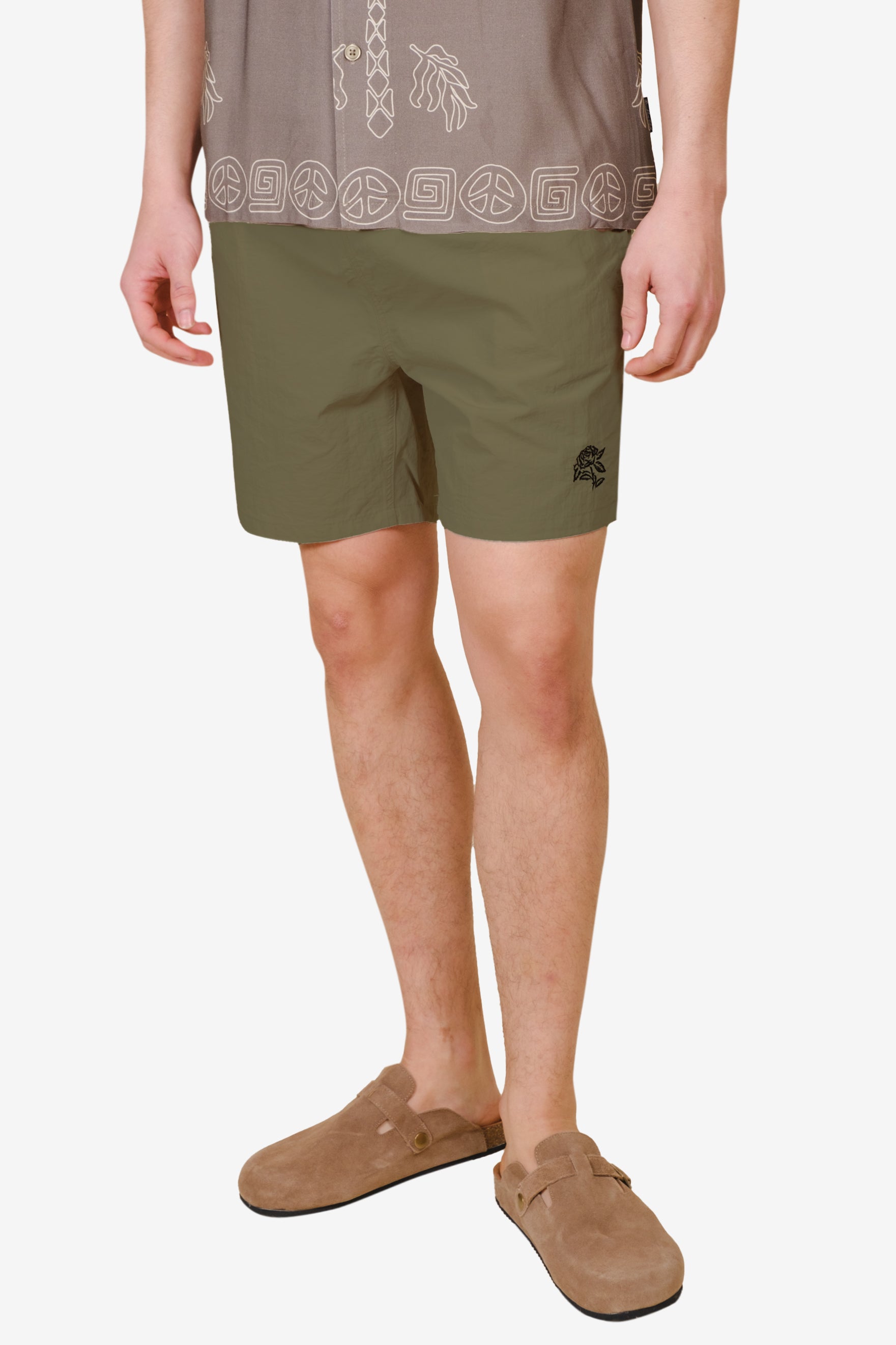 Men's monotone crinkle nylon shorts with flower detailing
#color_olive