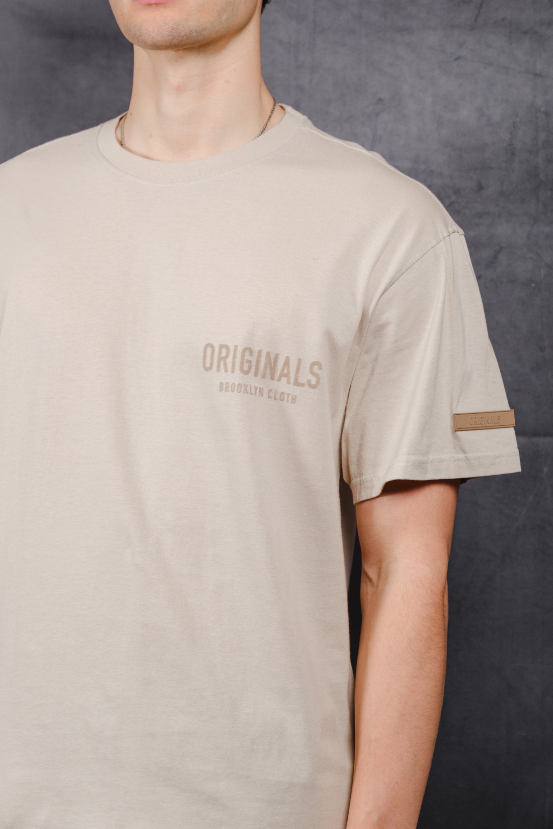 Classic Originals Front Flock Tee 
#color_pumice stone