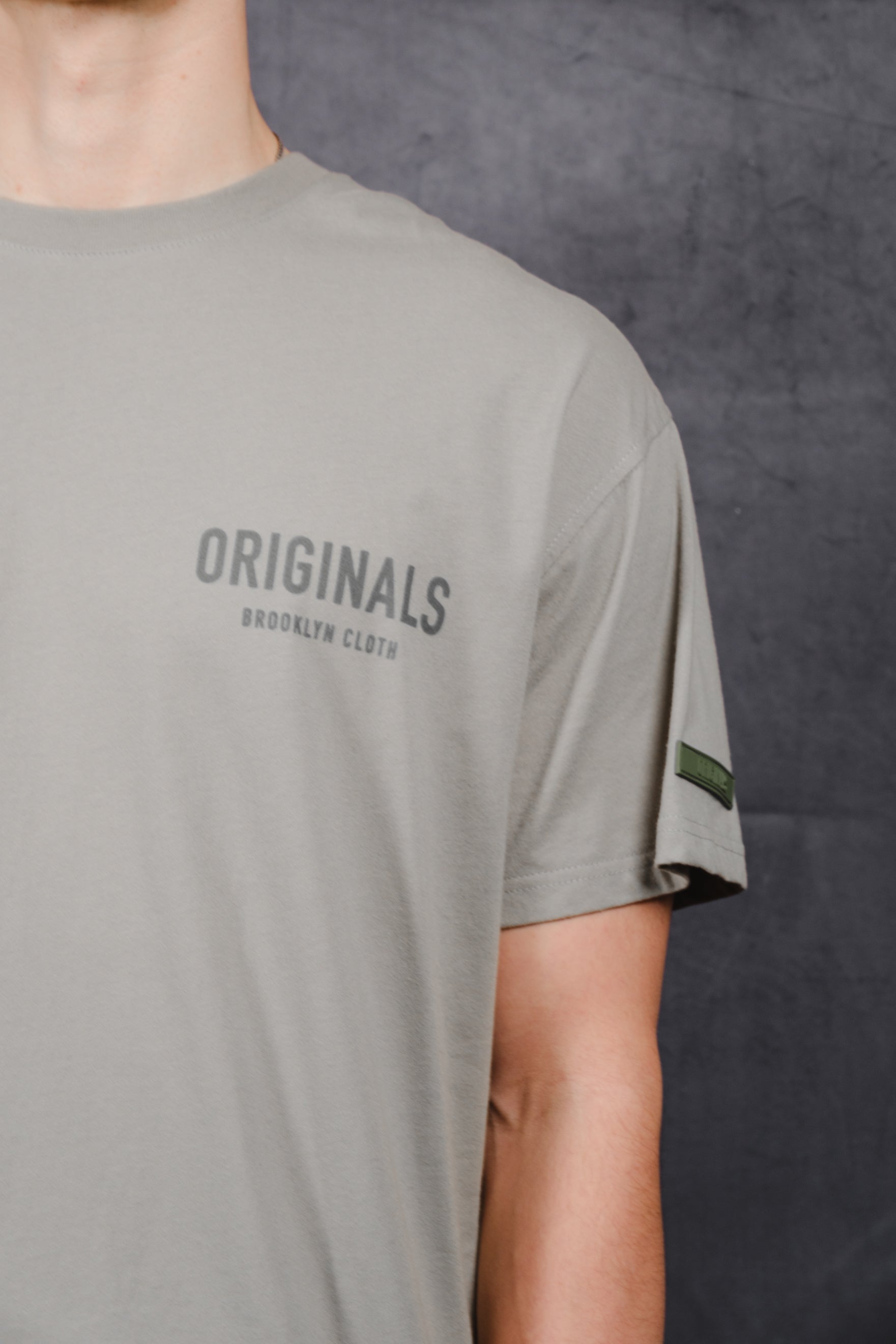 Soft and breathable Originals Front Flock Tee, classic fit with flocked logo
#color_sage