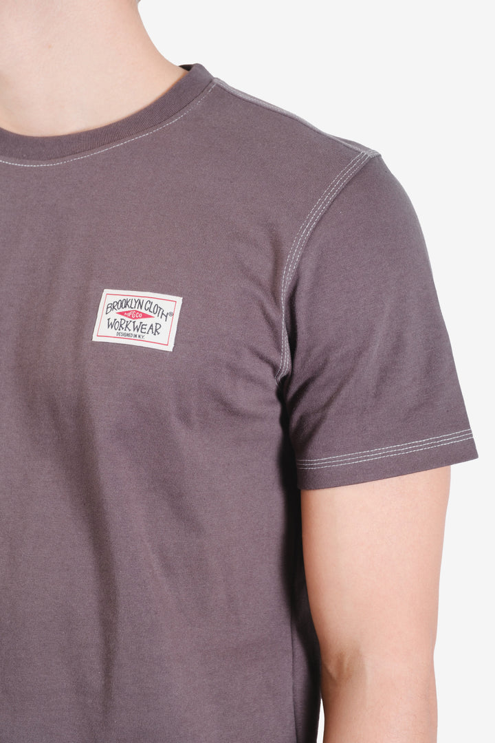 Men’s relaxed crewneck in 250 GSM cotton with branded logo.
#color_dusty-black