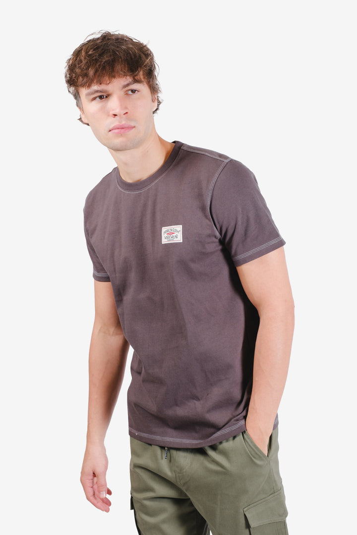 Cotton jersey crewneck with logo print and contrast stitch details.
#color_dusty-black