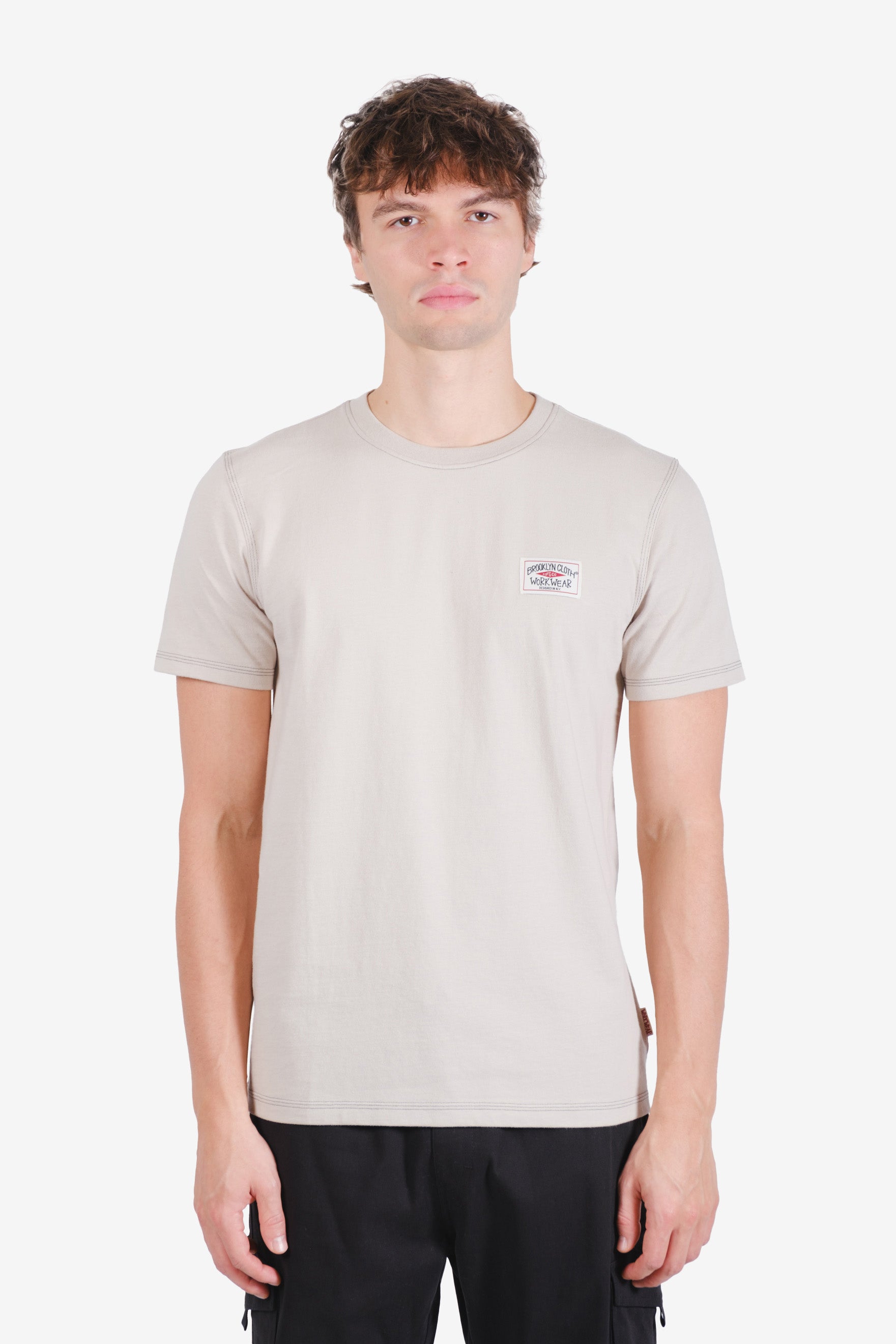Breathable cotton jersey crewneck with subtle logo and stitching
#color_sand