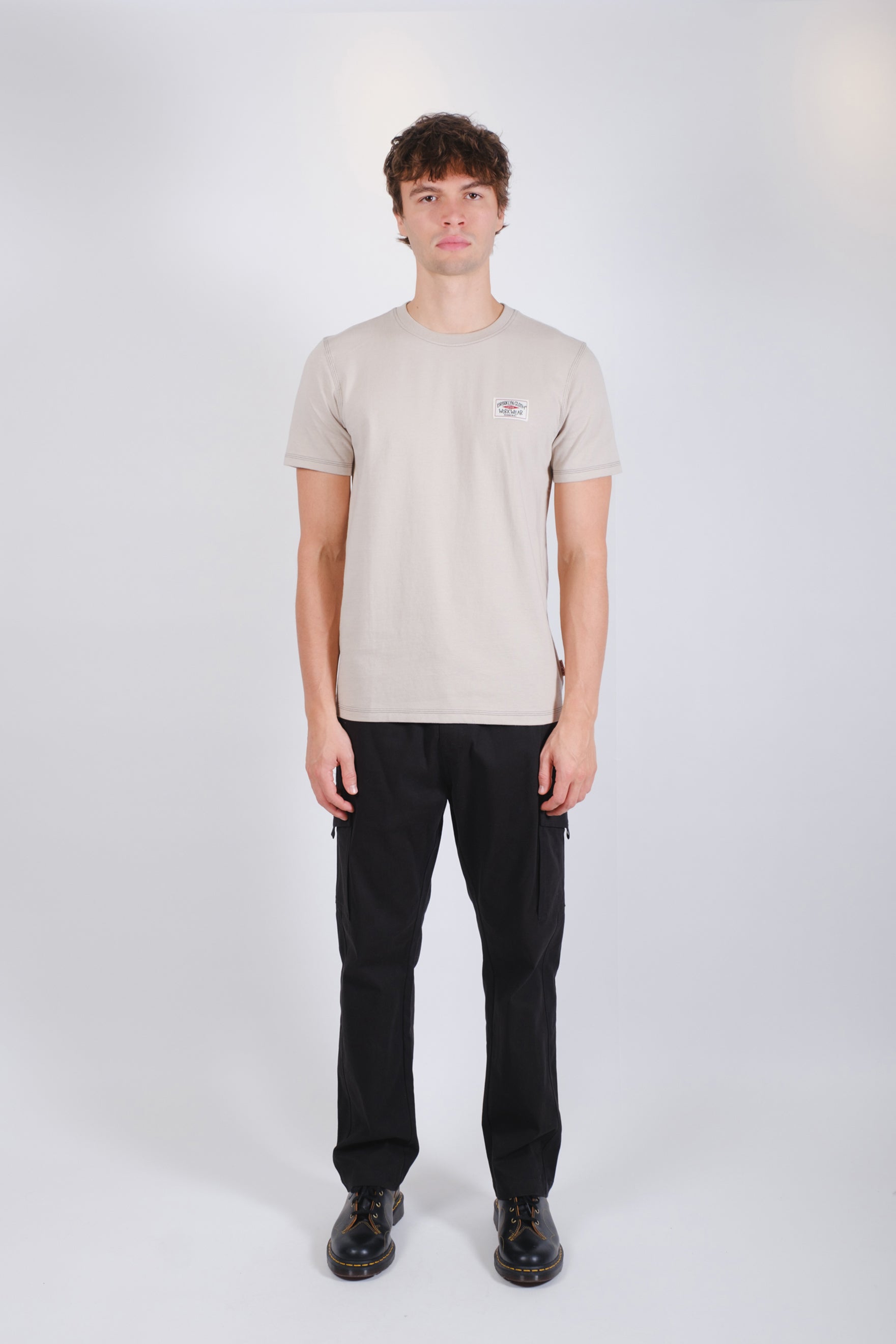 Breathable cotton jersey crewneck with subtle logo and stitching
#color_sand