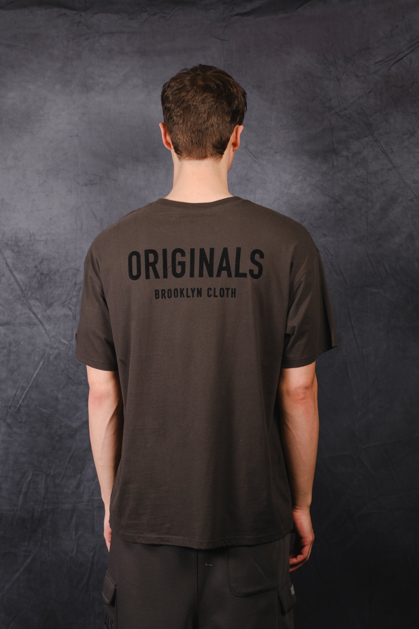 Breathable Originals Front Flock Tee with soft flocked logo design
#color_dusty black