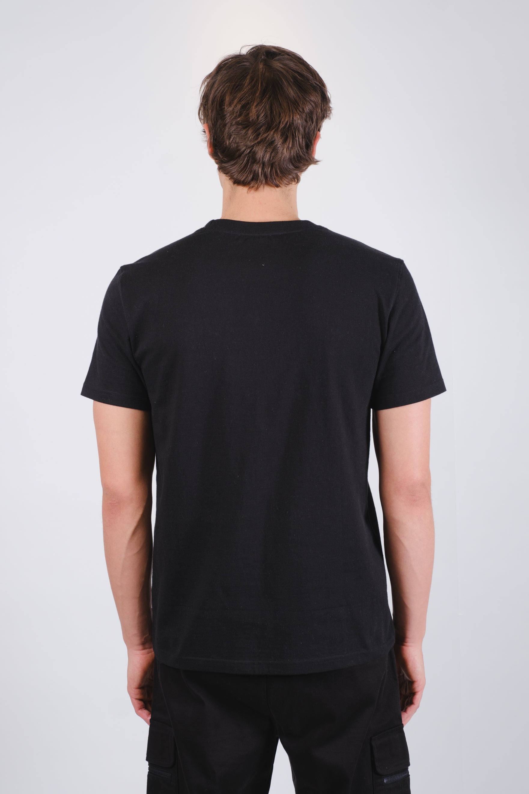 Lightweight nylon tee with short sleeves and zippered pocket
#color_black