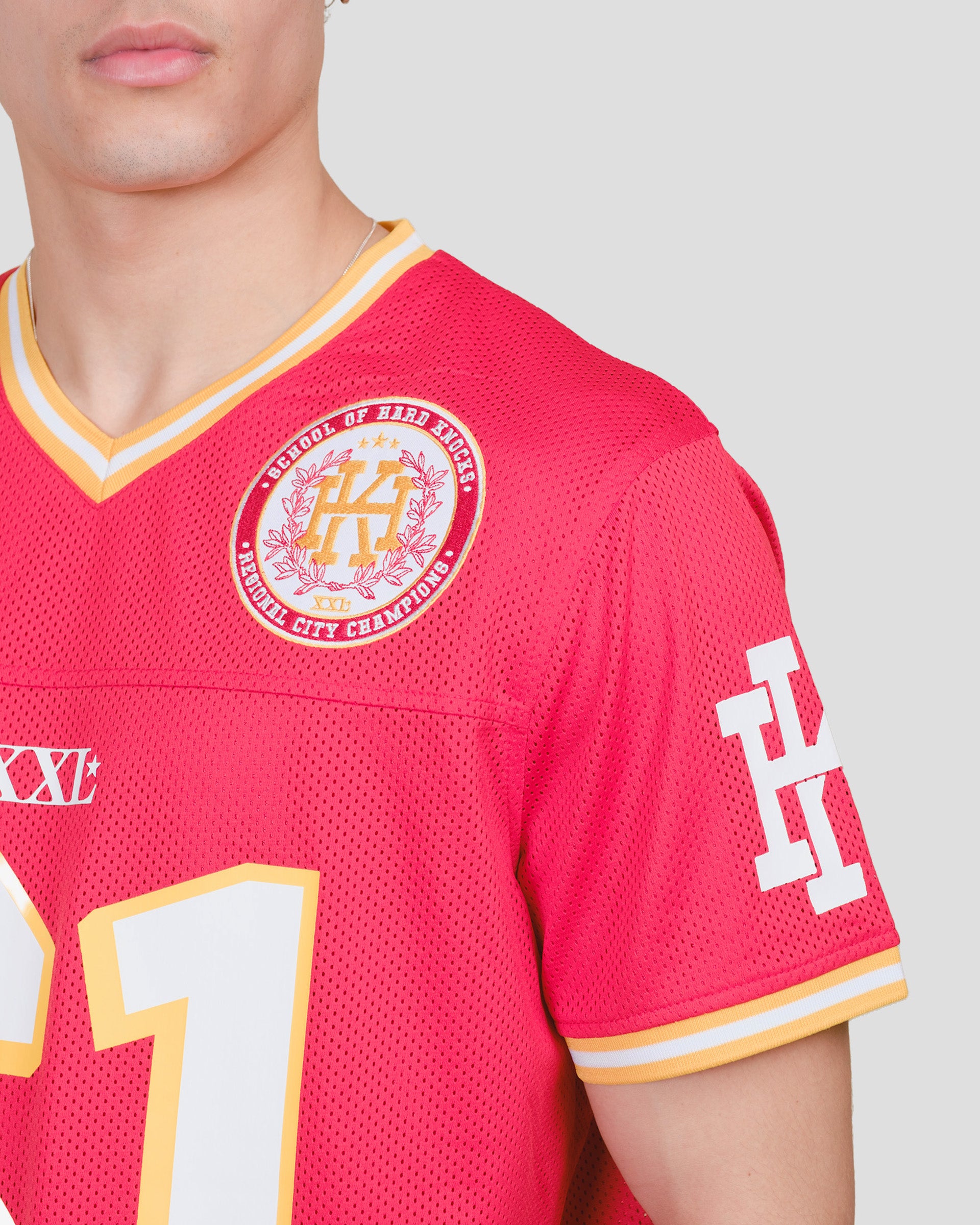 Red short sleeve hard knocks football jersey
#color_red