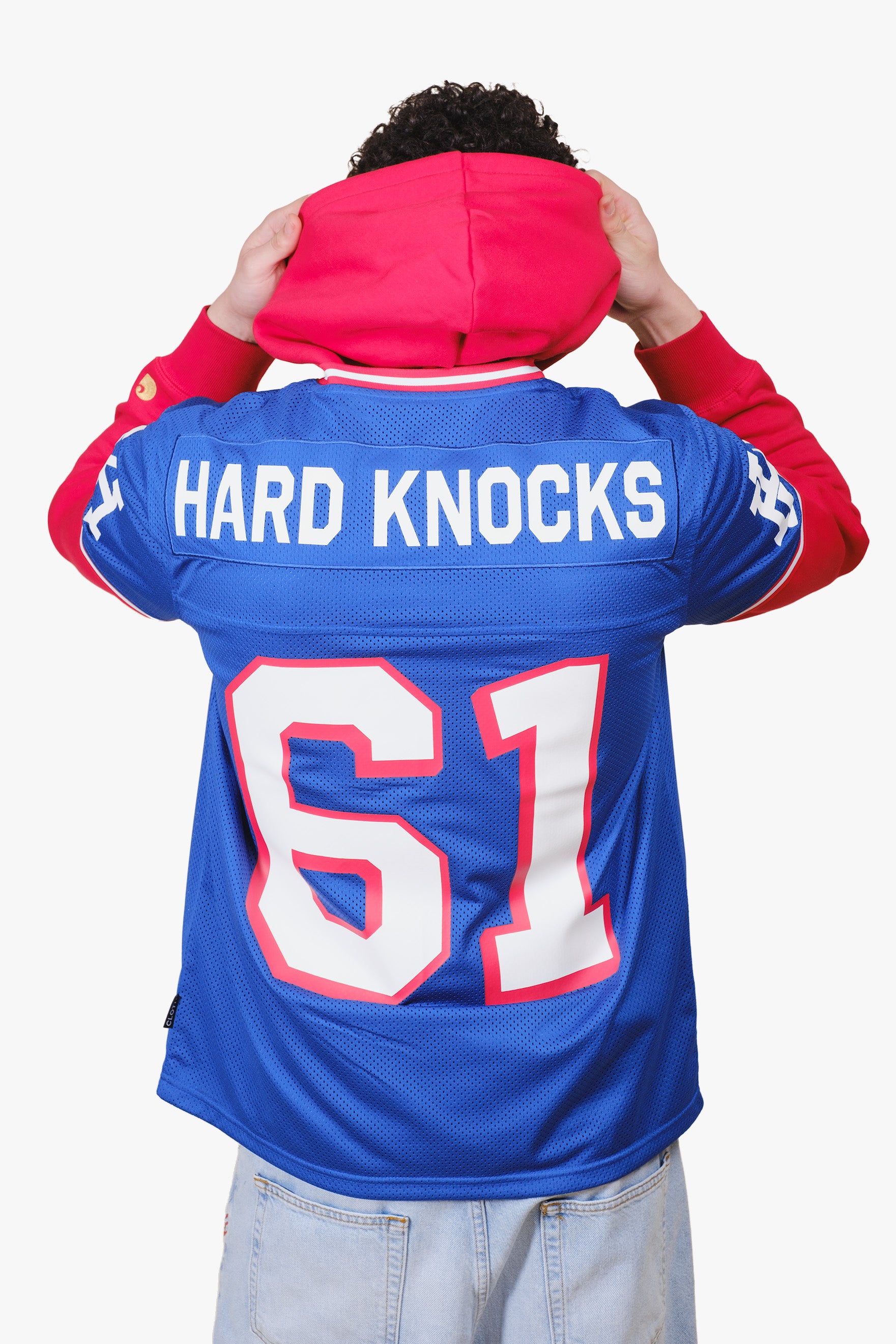 Blue hard knocks football jersey 
#color_royal blue