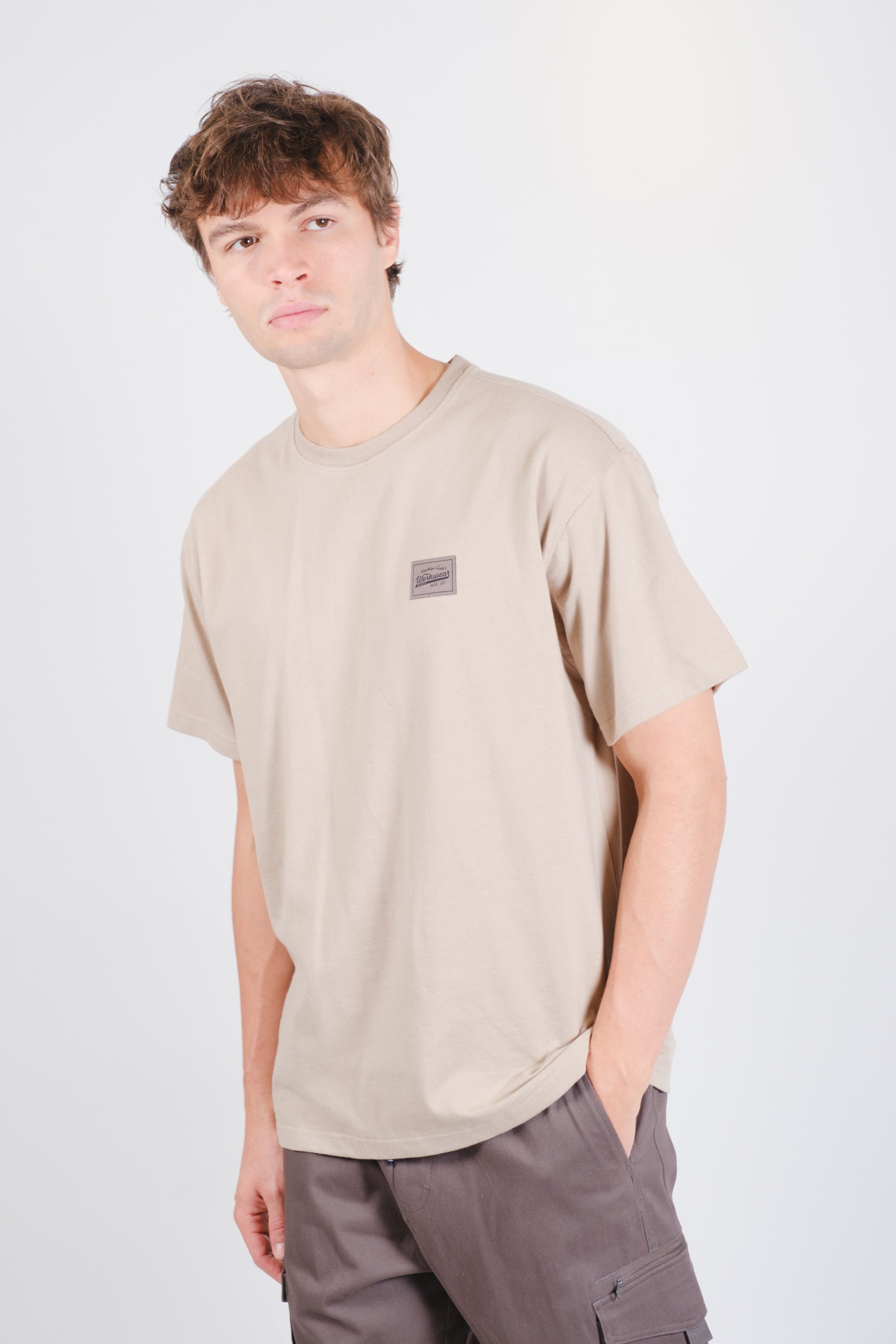 Short sleeve tee with back compass print, perfect for casual wear
#color_pumice stone_