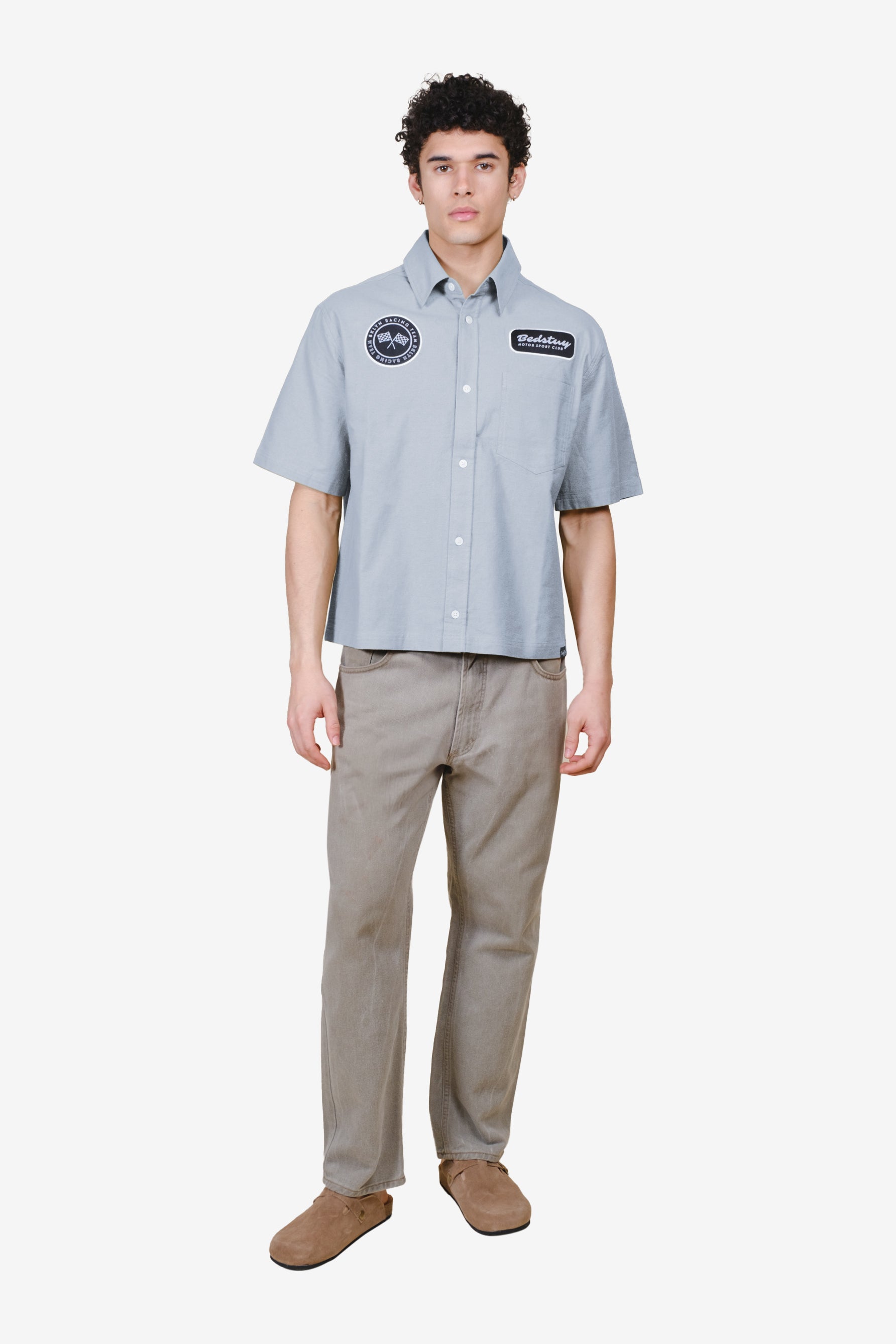 Easy to style, mens button up shirt with button up front and patch detailing on chest 
#color_quarry