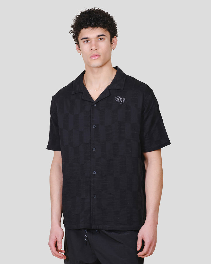 Men's Jacquard woven button down shirt with checkered pattern and dice detail #color_black