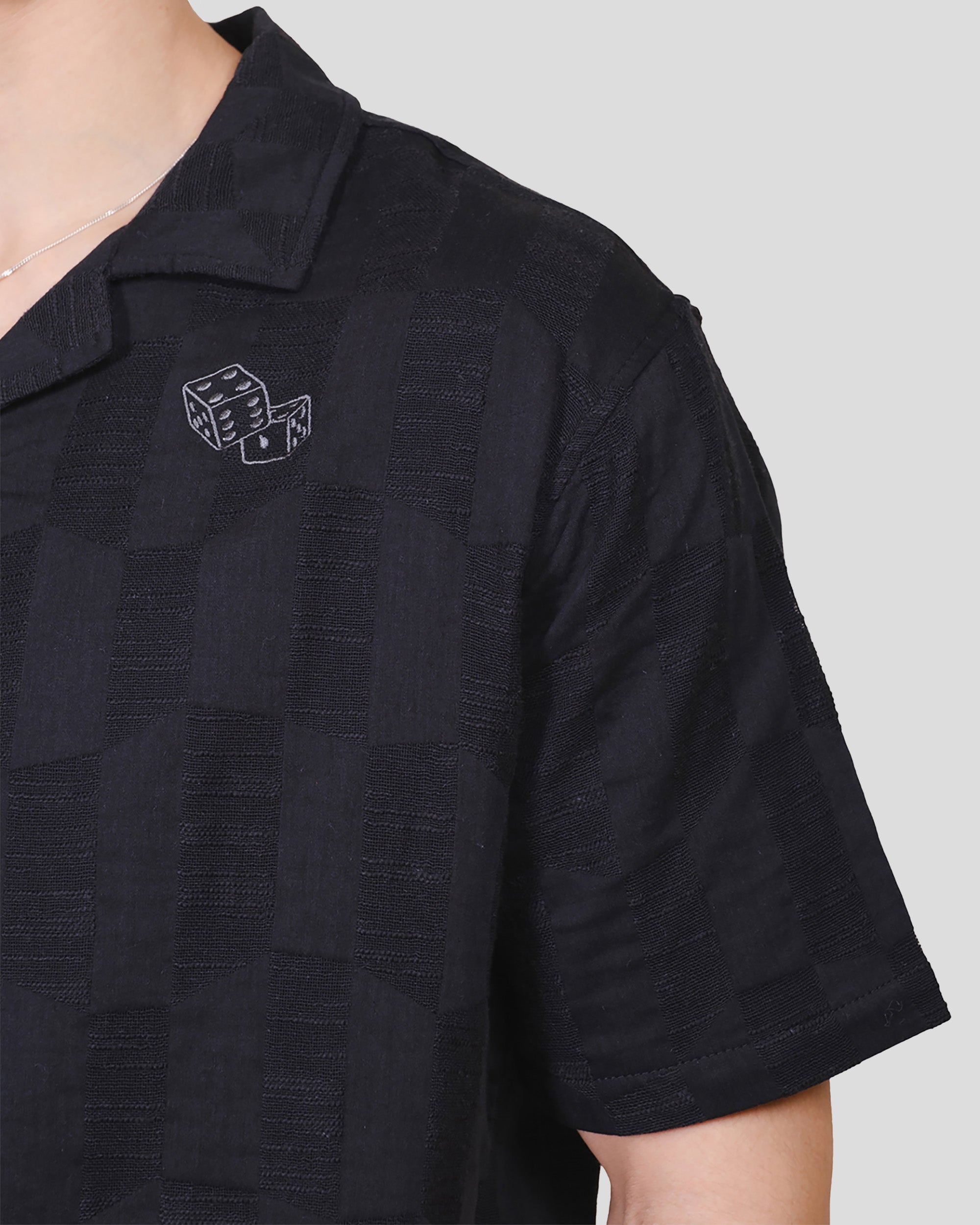 High quality men's woven tip with textured checkered pattern and dice embroidery #color_black