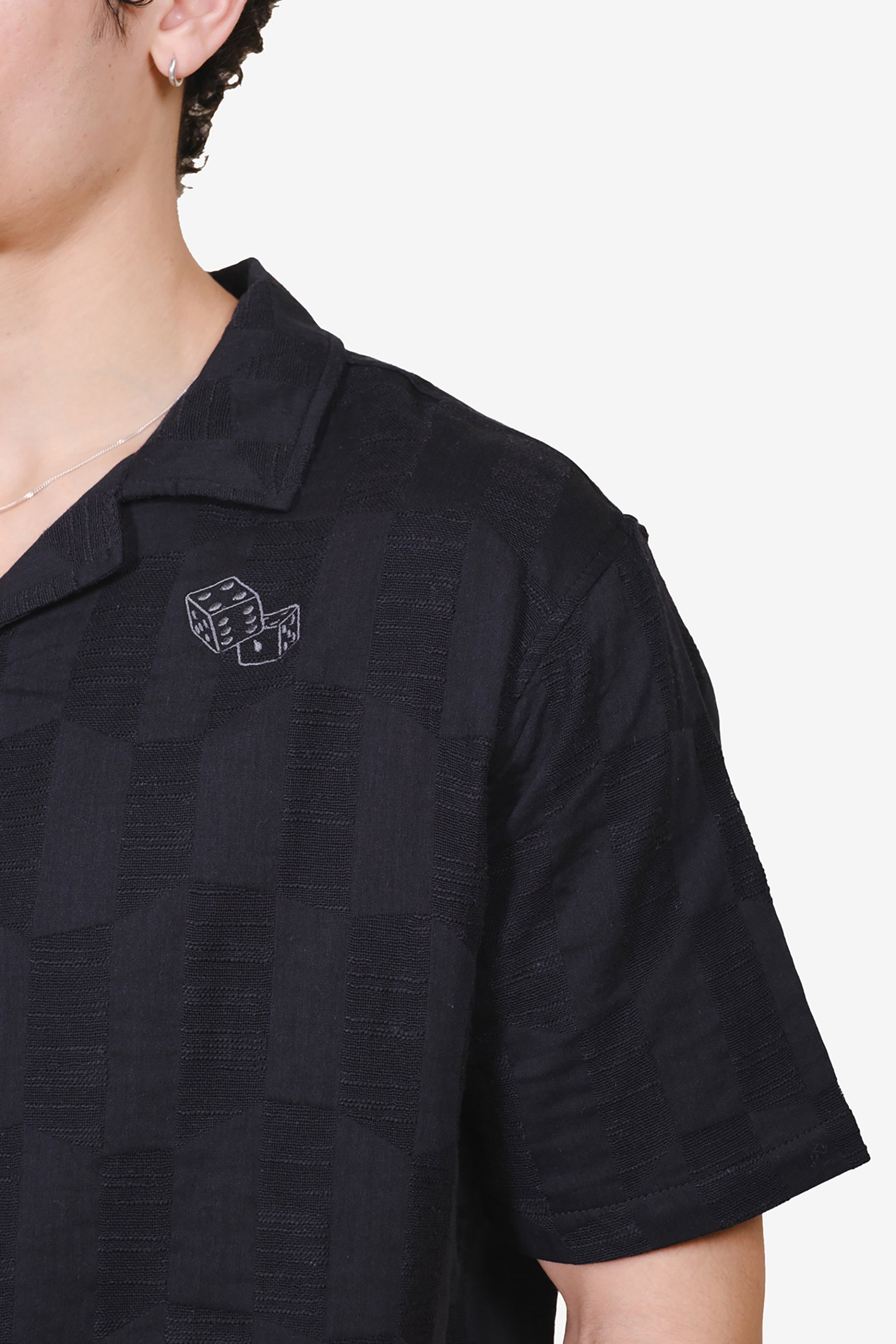 High quality men's woven tip with textured checkered pattern and dice embroidery #color_black