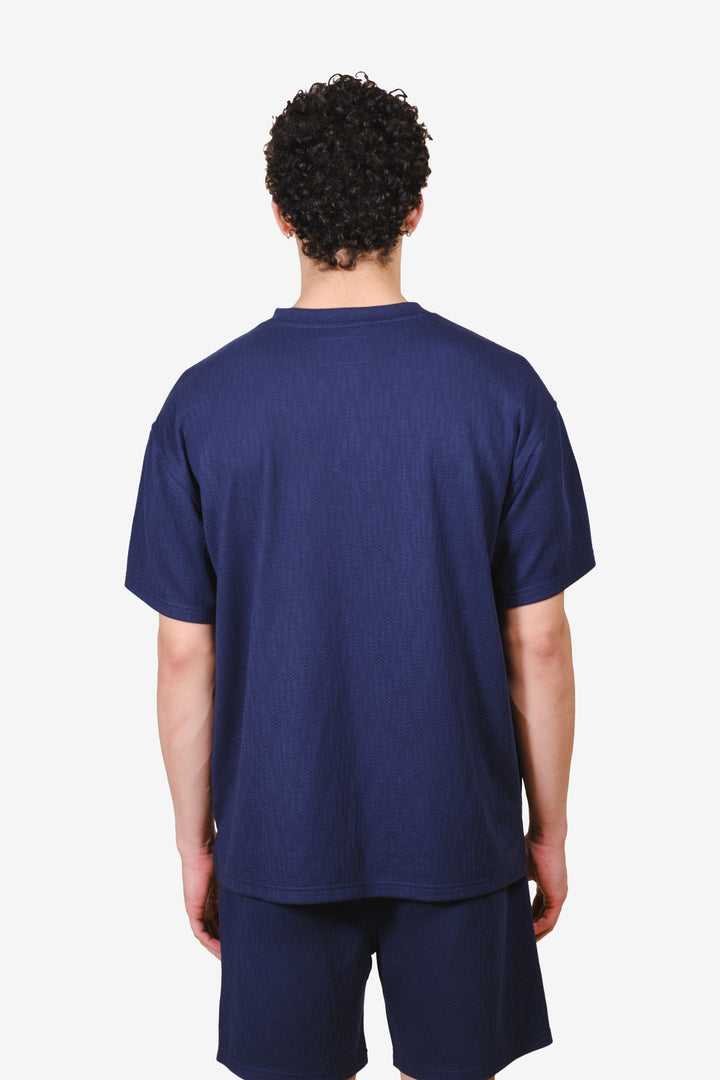 French navy relaxed fit vertical cross embroidered tee 
#color_french-navy