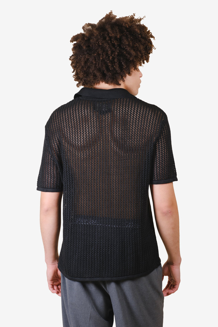 Stylish loose knit camp shirt with camp collar and button down front
#color_black