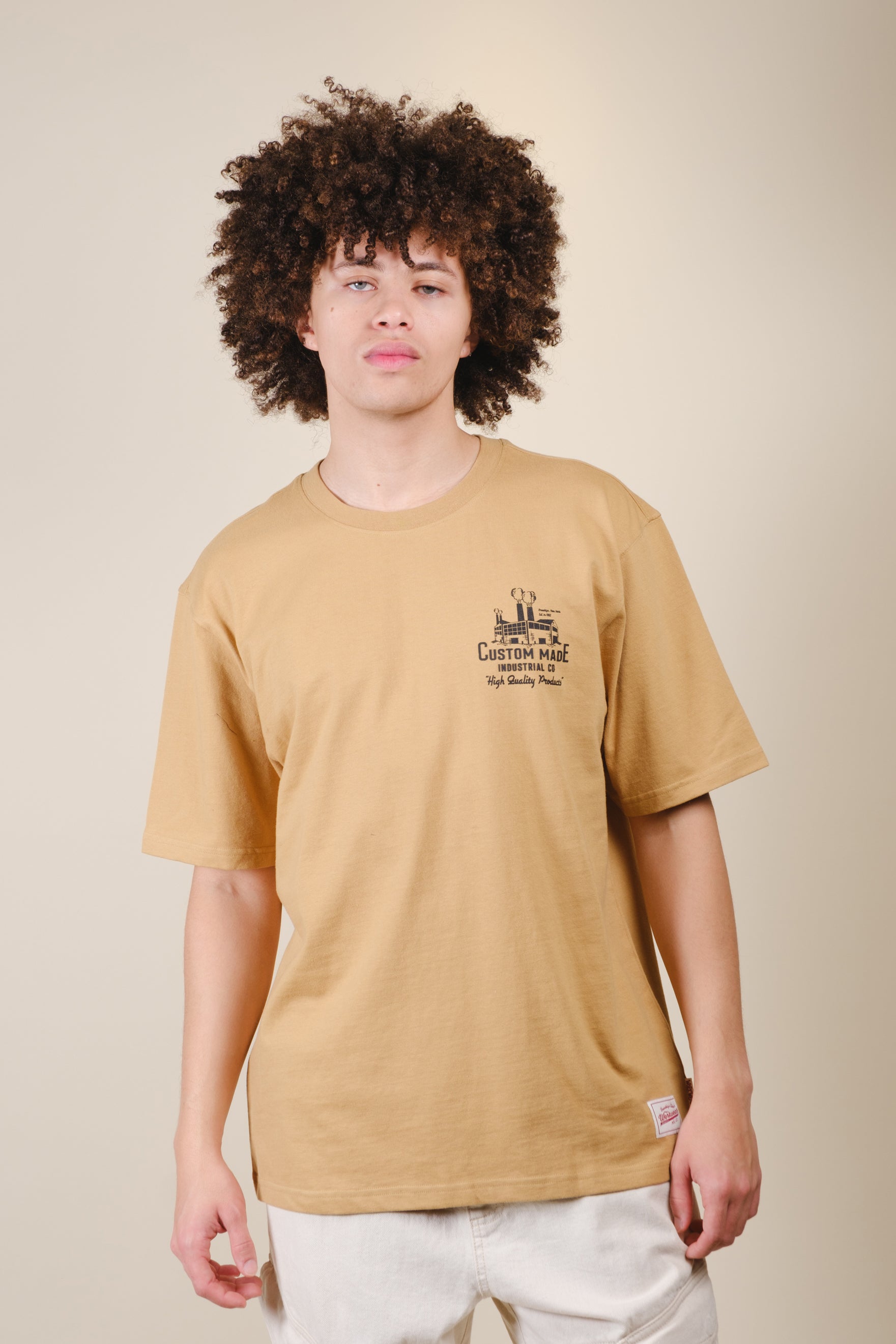 Premium heavyweight men's t-shirt with printed artwork on upper right #color_curry