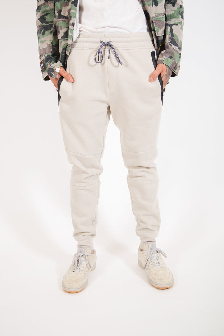 Men's fleece jogger pants with comfortable diagonal heat-sealed pockets
#color_sand