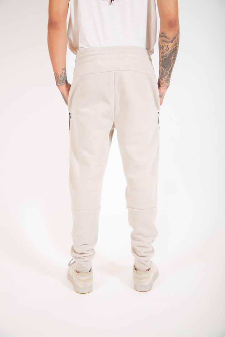 Men's tapered jogger pants with fleece fabric, heat-seal diagonal pockets 
#color_sand