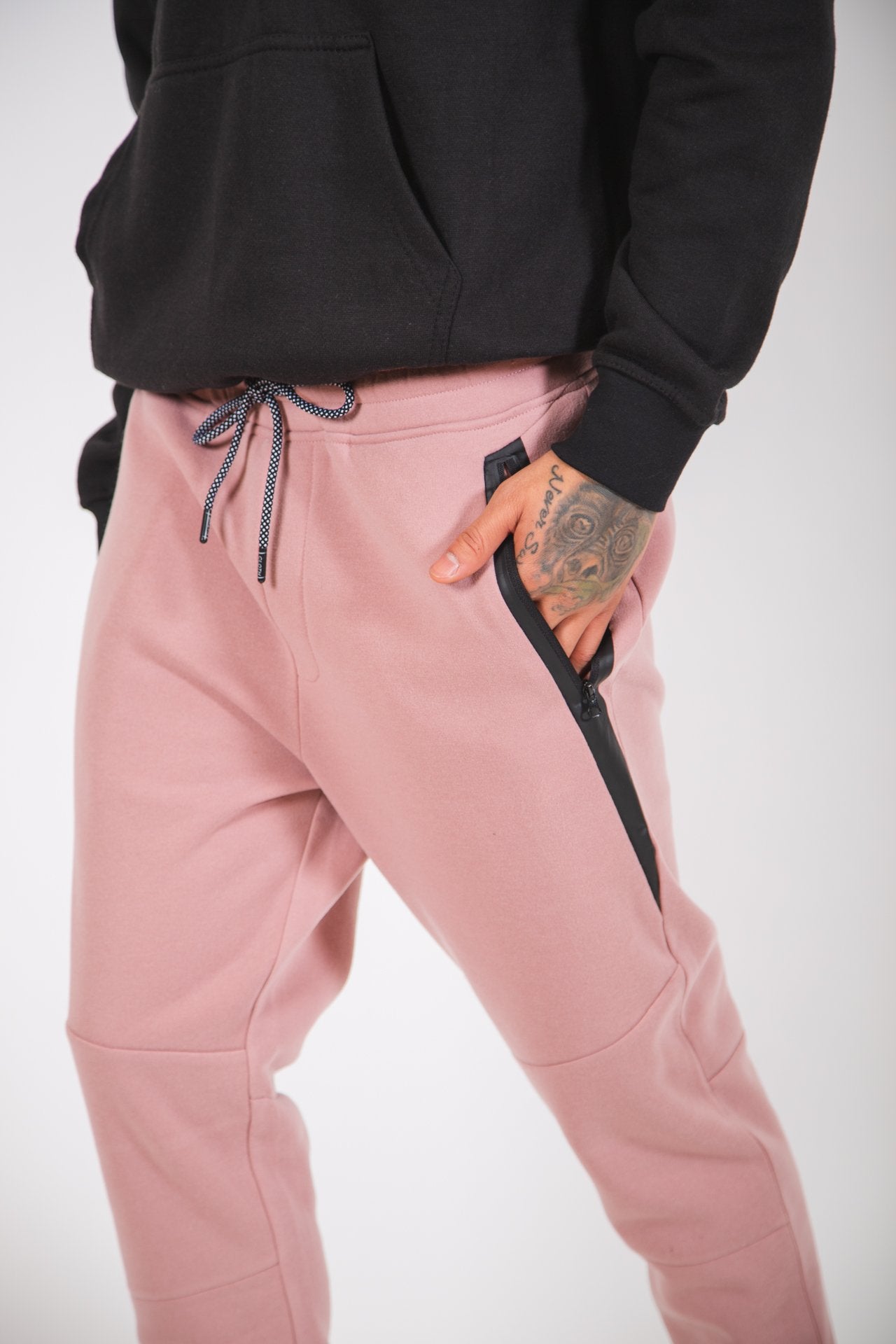 Men's athletic fleece jogger with diagonal heat seal pockets, elastic cuffs
#color_dusty rose