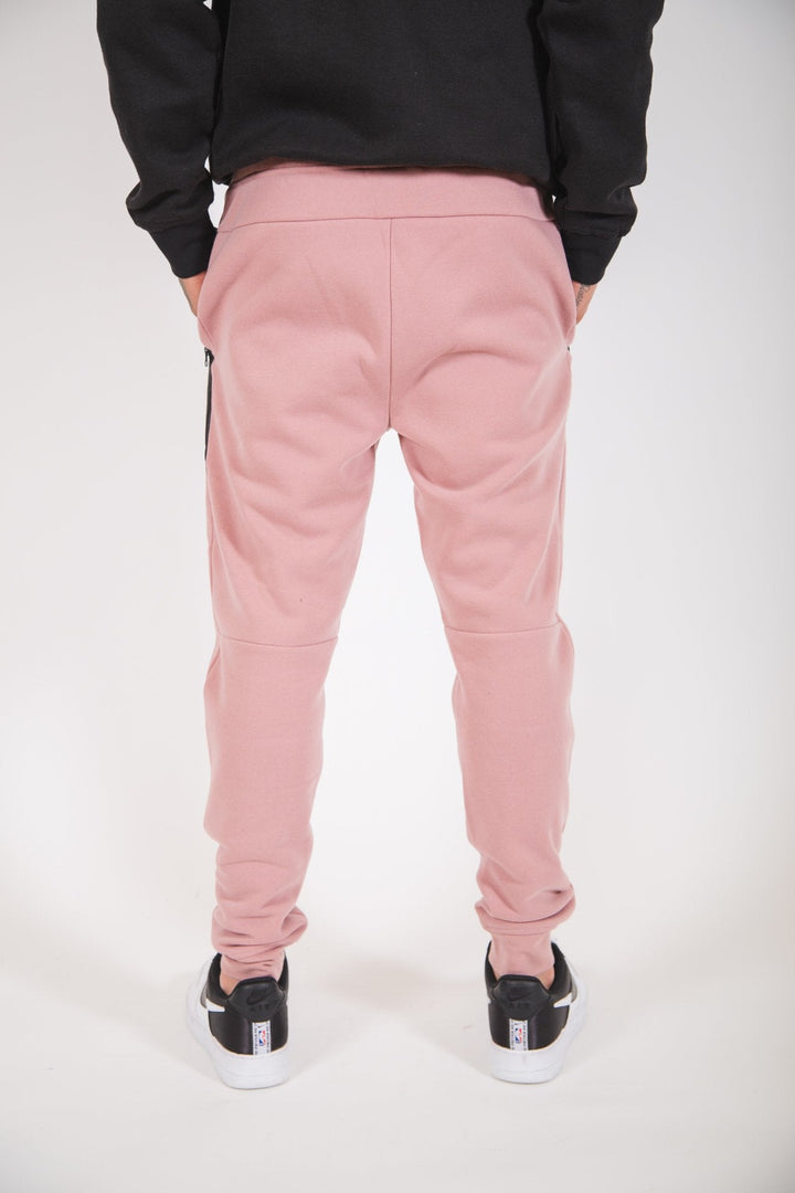 Dusty Rose fleece jogger pants for men with angled heat-sealed side pockets
#color_dusty-rose