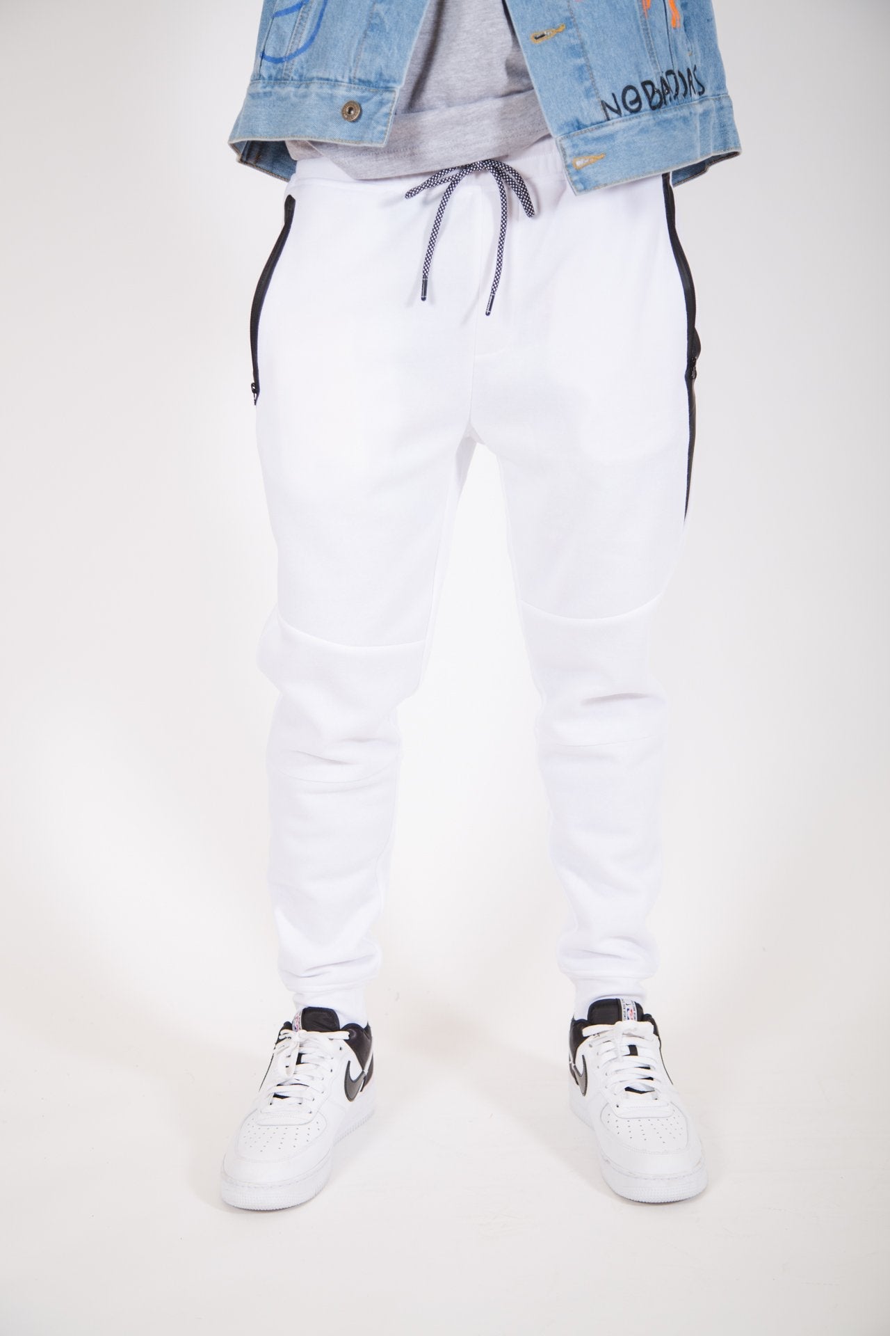 Fleece jogger pants with diagonal heat-sealed side pockets, men's fit
#color_white 