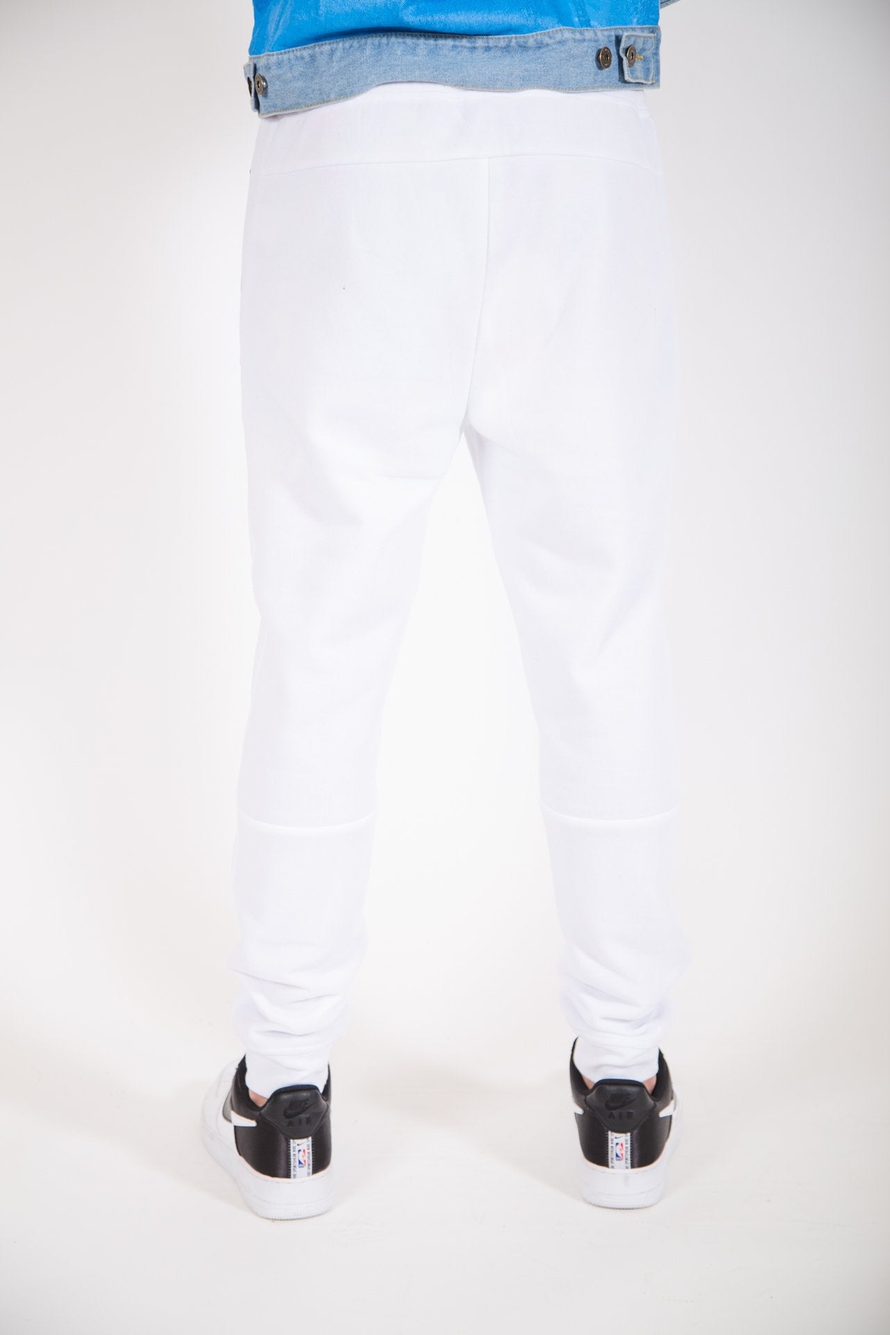 Slim-fit white fleece jogger pants with heat-sealed diagonal side pockets for men
#color_white 