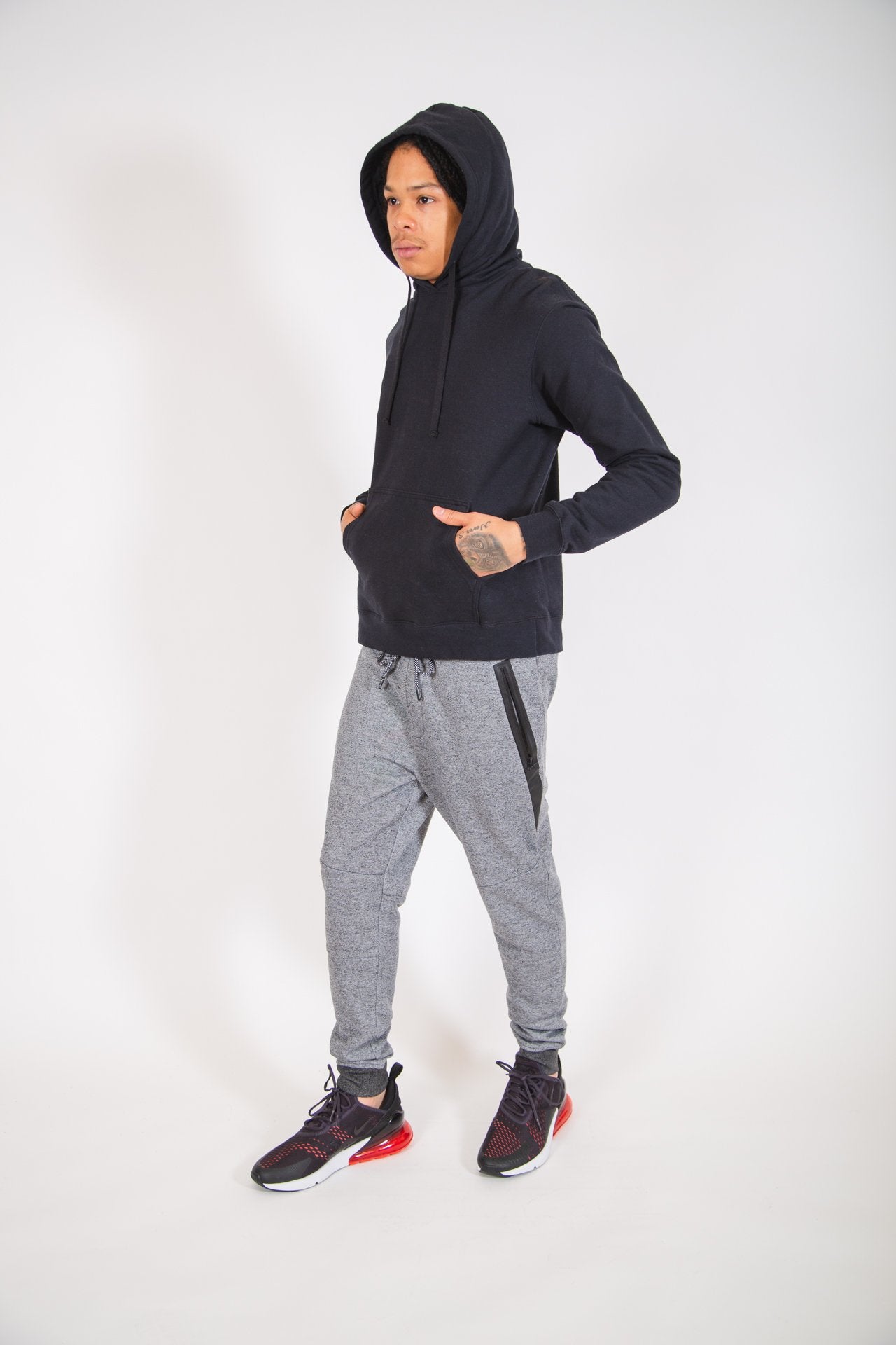 Jogger pants in soft fleece with diagonal heat-seal pockets
#color_black-marl