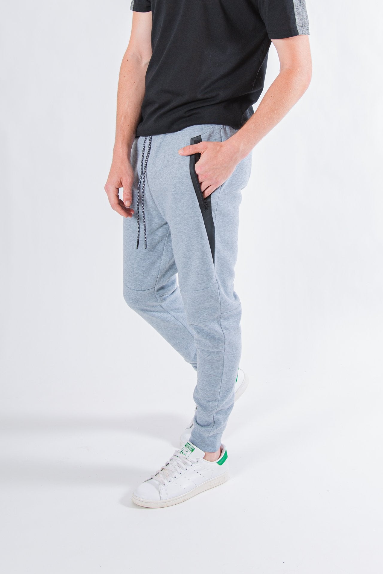 Men's charcoal fleece jogger pants with heat sealed diagonal side pockets #color_heather grey