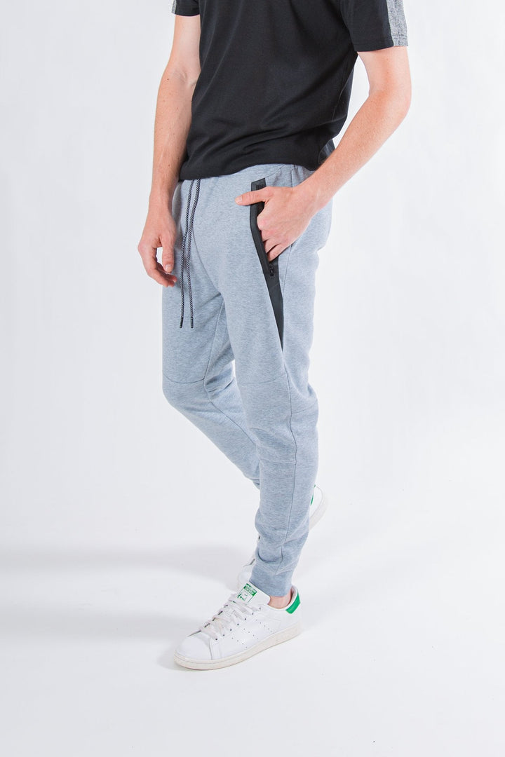Men's charcoal fleece jogger pants with heat-sealed diagonal side pockets #color_heather-grey