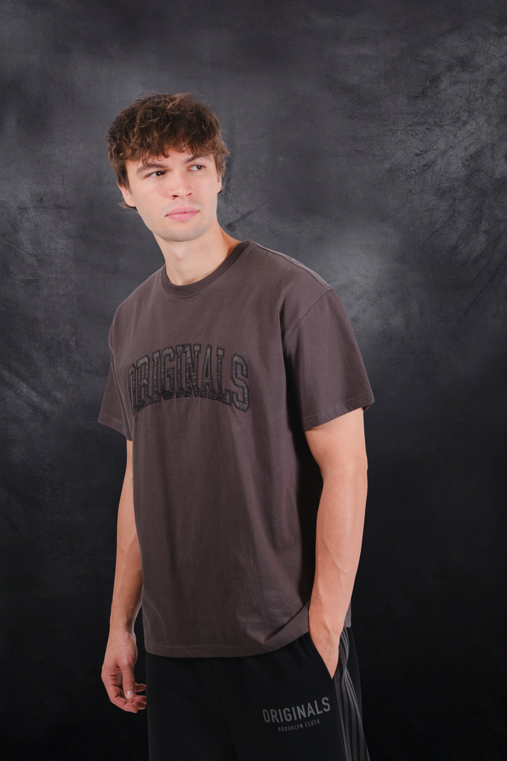 Men’s Originals Tee with satin applique, classic crew neck style
#color_dusty-black