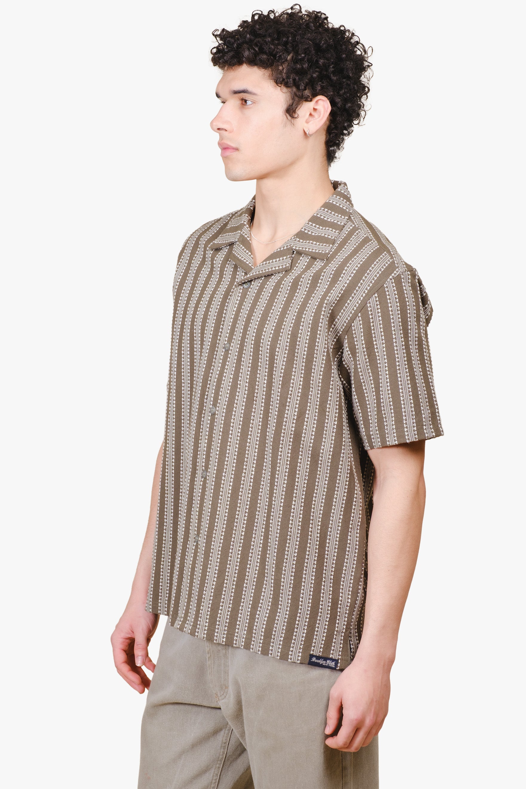 Men's olive camp collar button up striped shirt. #color_olive fairway