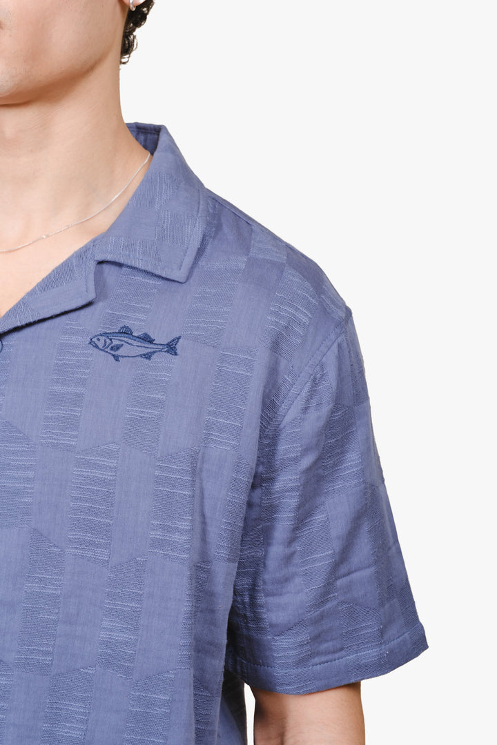 Men's woven shirt with textured checkered pattern and camp collar 
#colorcoastalblue