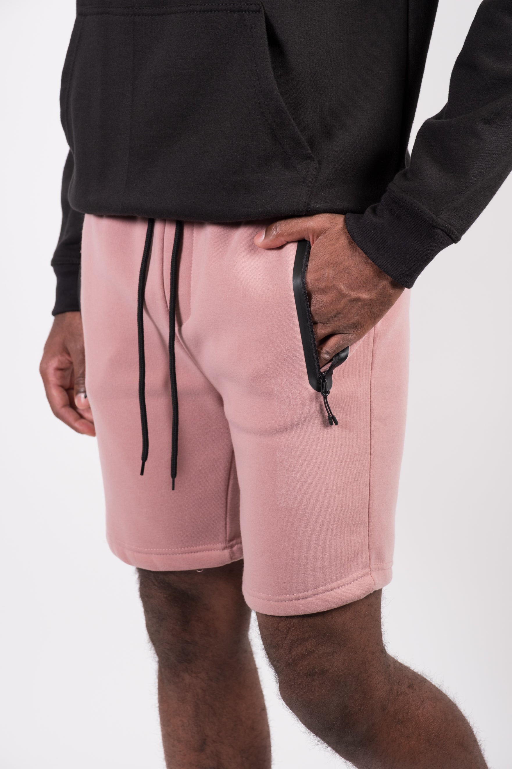 Elastic waistband Heat Seal Zip Shorts for men with functional pockets
#color_dusty rose