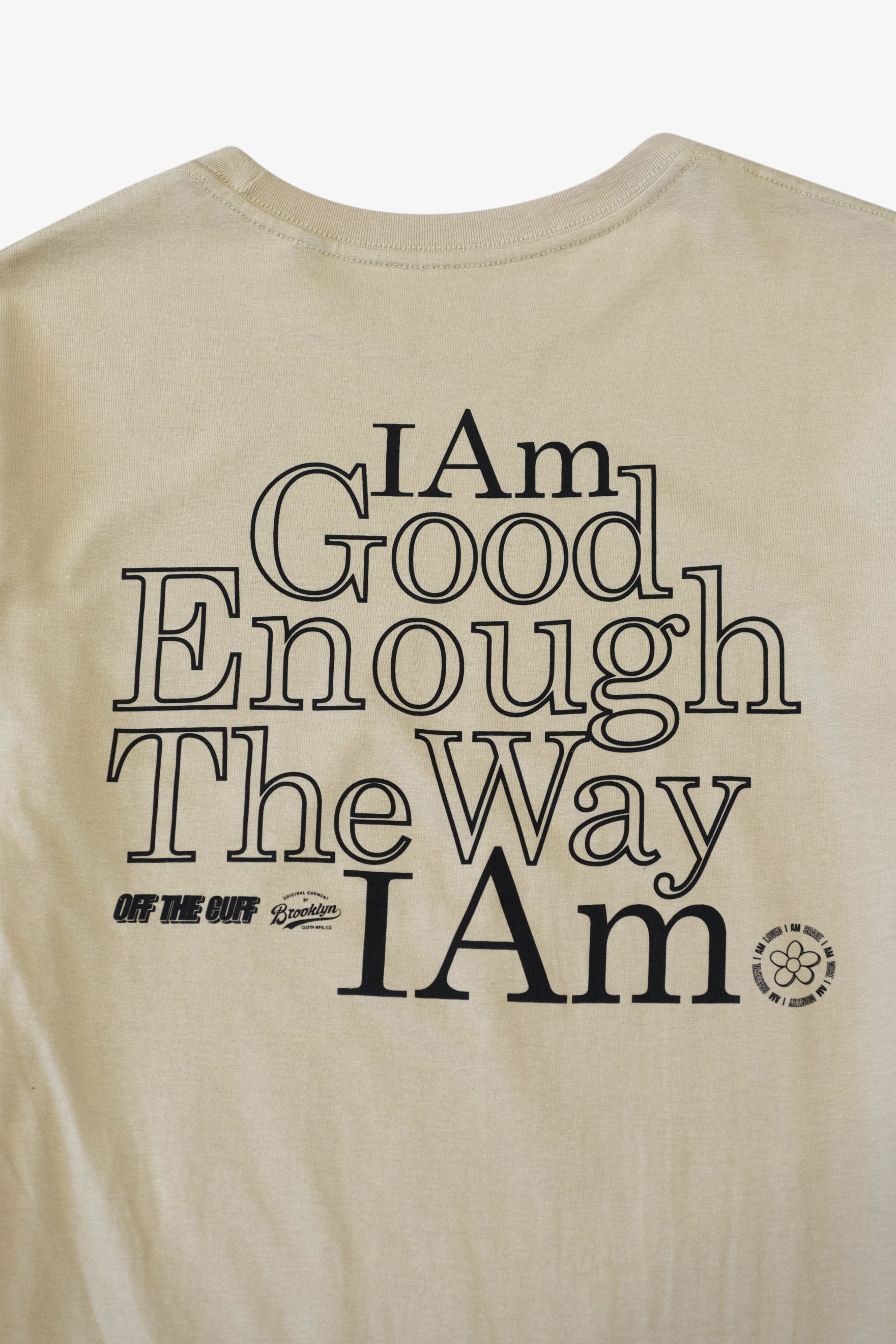 Off the Cuff t-shirt with graphic writing on back 